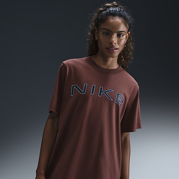 Marrone Top maglie e t shirt. Nike CH